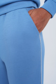 Niebieskie spodnie dresowe ze srebrnym akcentem