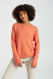 Pomarańczowy sweter z troczkami u dołu