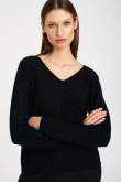 Elegancki, czarny sweter z połyskującymi cekinami