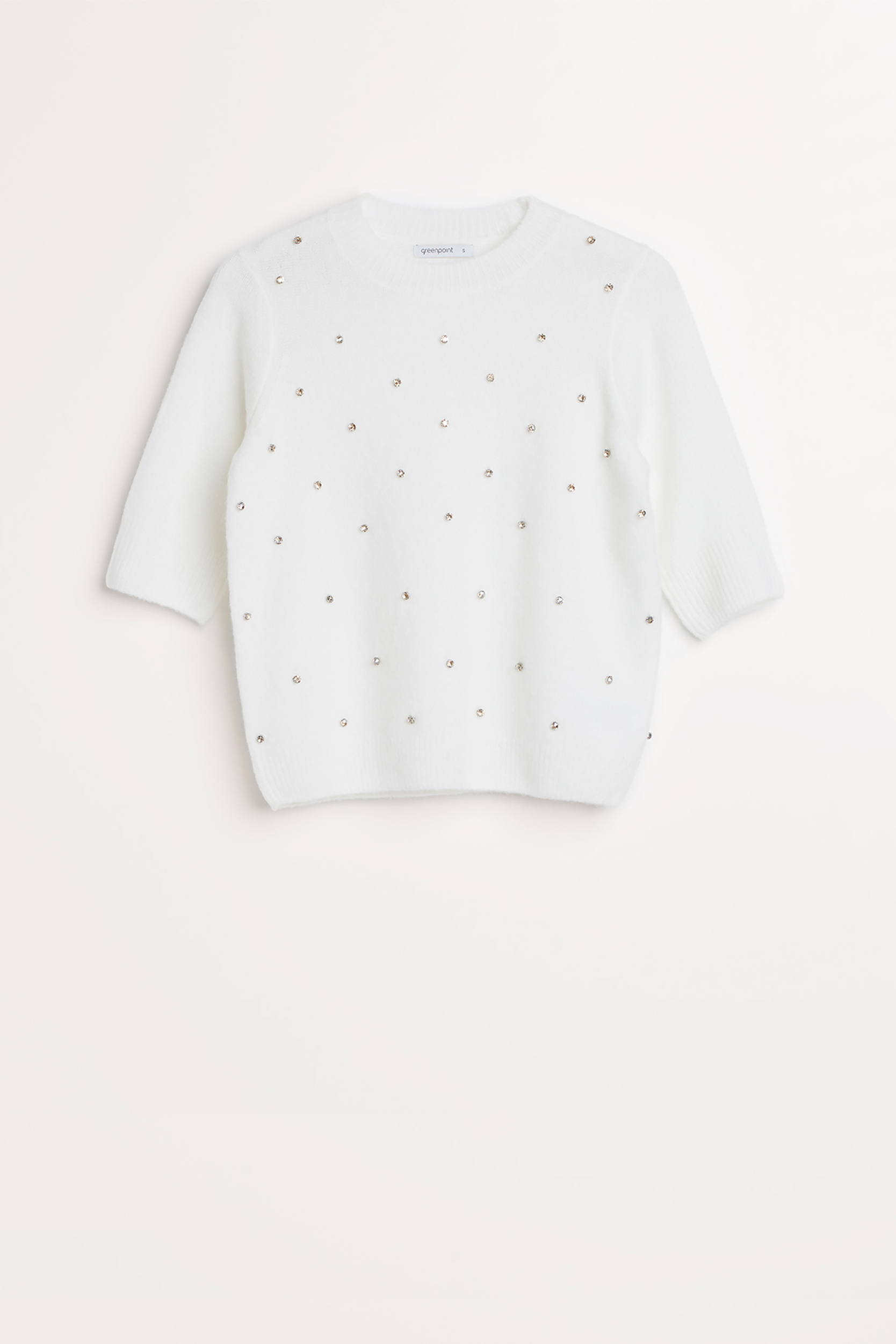 Kremowy sweter z błyszczącą aplikacją z cyrkonii