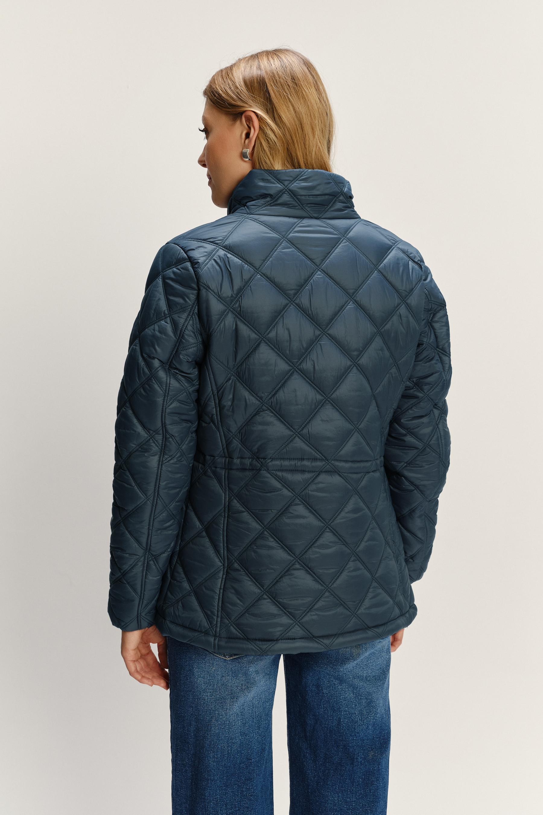 Turkusowa pikowana kurtka z wysokim kołnierzem