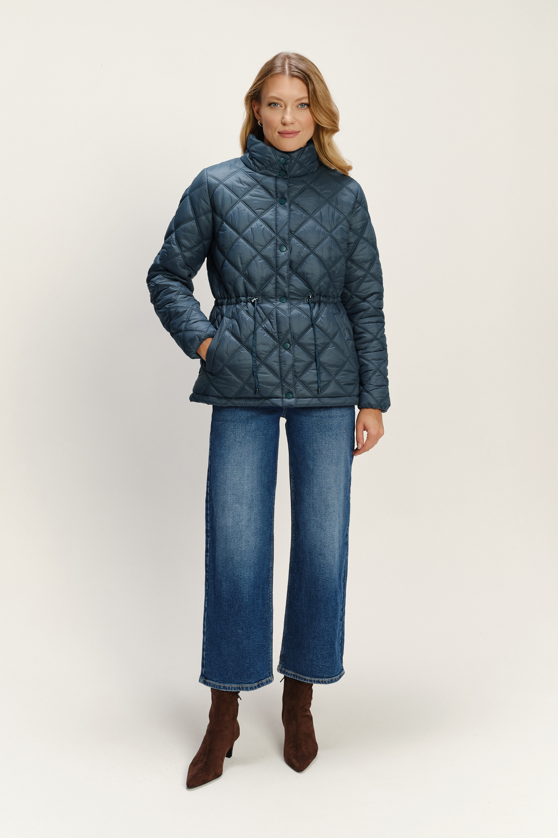 Turkusowa pikowana kurtka z wysokim kołnierzem